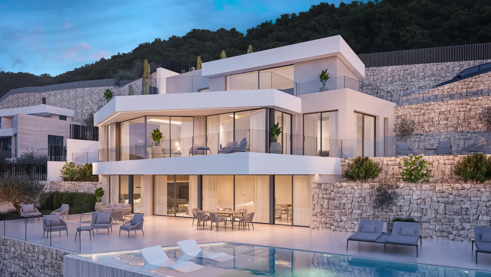 Villa facade with a pool and glass-fronted terraces
